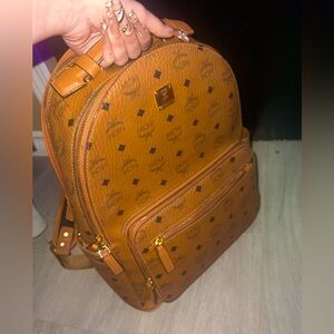 Mcm brown/gold monogram backpack